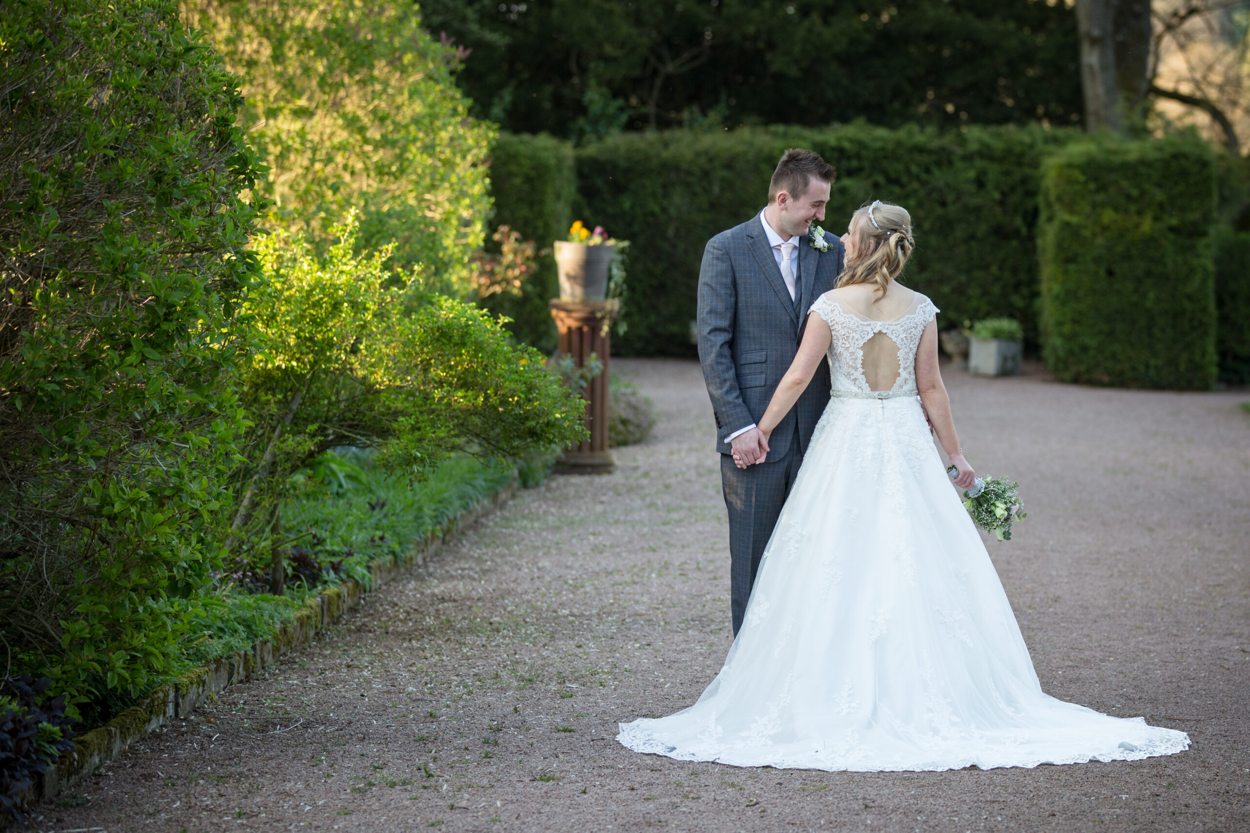 bride and groom at Clearwell Castle, Gloucestershire by Kathryn Goddard Photography