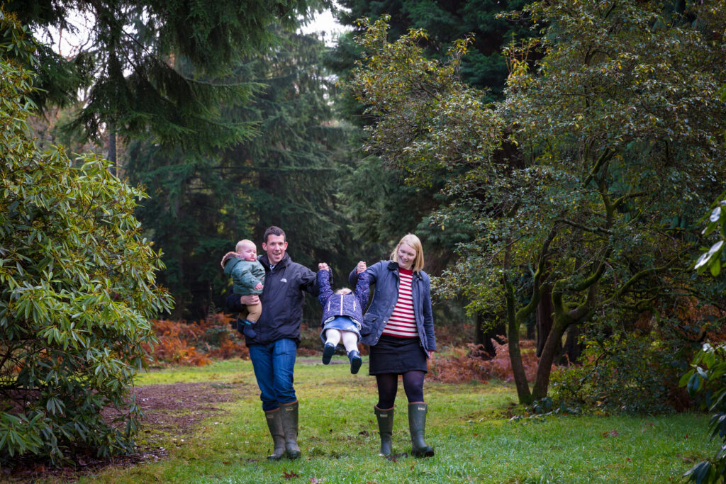 Family of four walking in the Forest of Dean