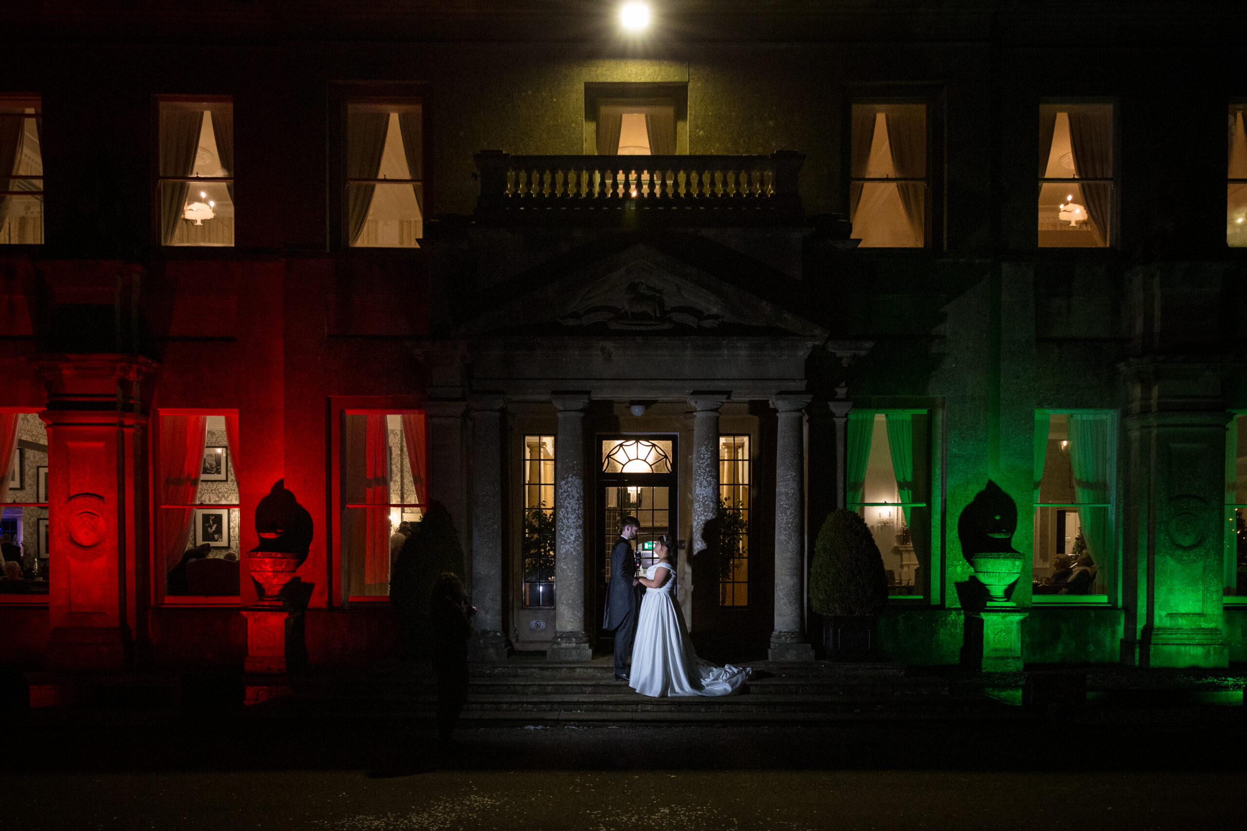 Night time portrait of Bride and Groom at Tracy Park by Kathryn Goddard Photography