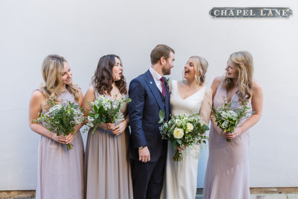 Bride and groom with bridesmaids, Cheltenham - Kathryn Goddard Photography