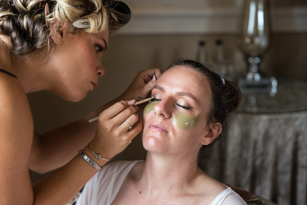 Bride having her make up Clearwell Castle